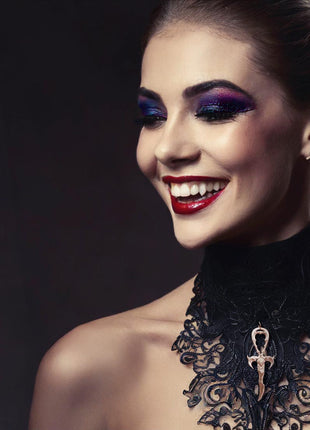 Susannah is wearing a 3rd Generation Legacy Ankh in Rose Gold with Opal Gem. She is wearing Classic Canines. Makeup by JoHanna  Moresco. 